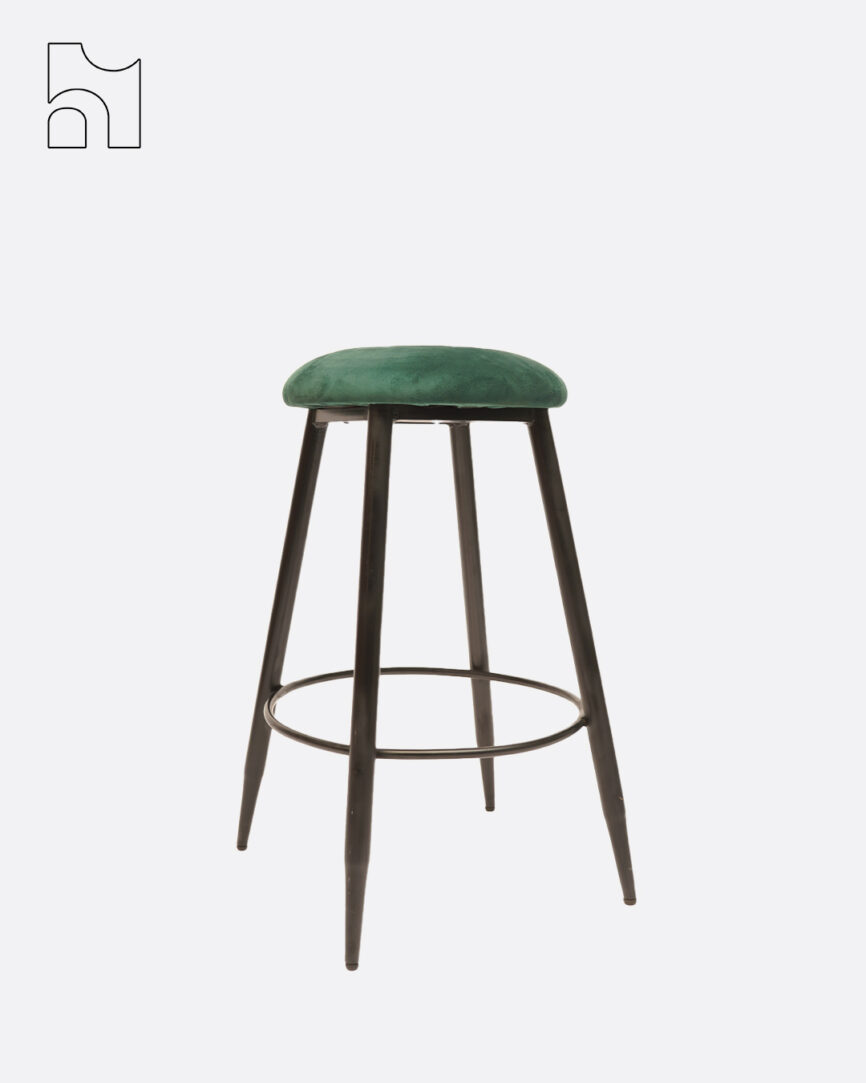 Green velvet bar stool with black metal legs and footrest